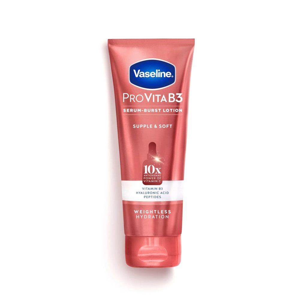A tube of Vaseline ProVita B3 Serum-Burst Lotion, featuring a soft pink design with text that highlights water hydration and key ingredients like Vitamin B3 and hyaluronic acid.