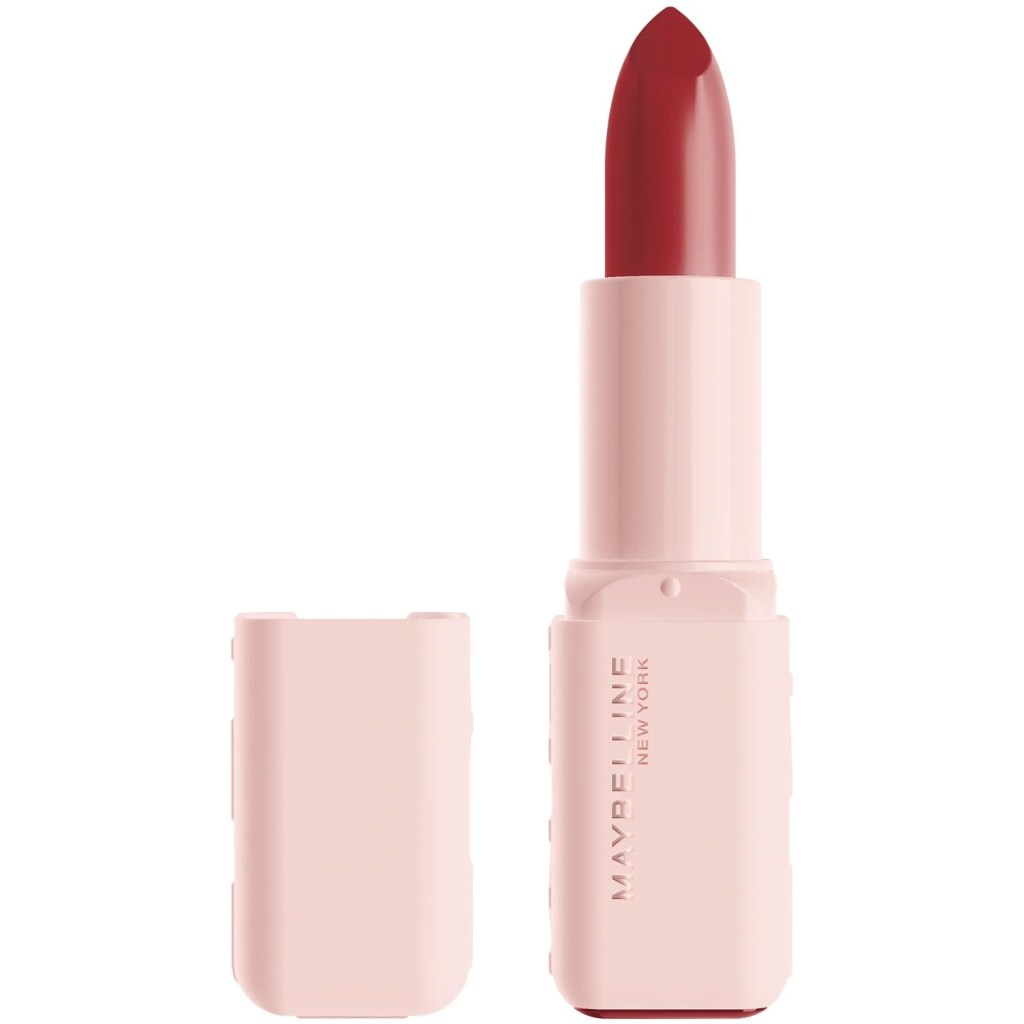 A closed pink lipstick tube with a bold red lipstick bullet exposed, featuring 'Maybelline New York' branding.