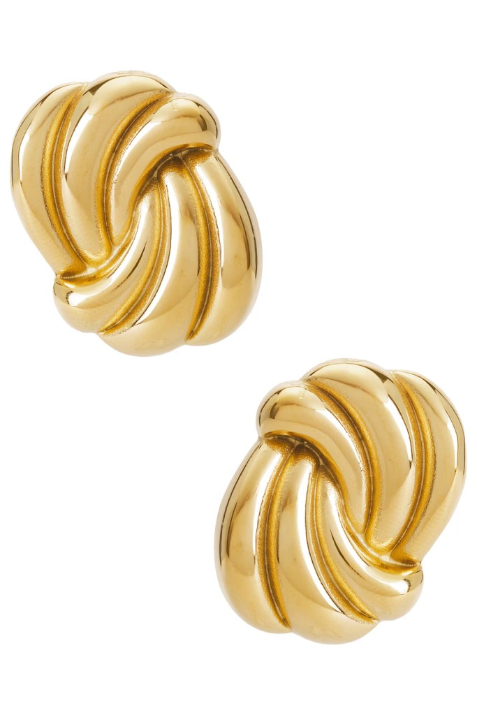 A pair of elegant gold-tone earrings with a twisted design, featuring rounded shapes and a shiny finish.